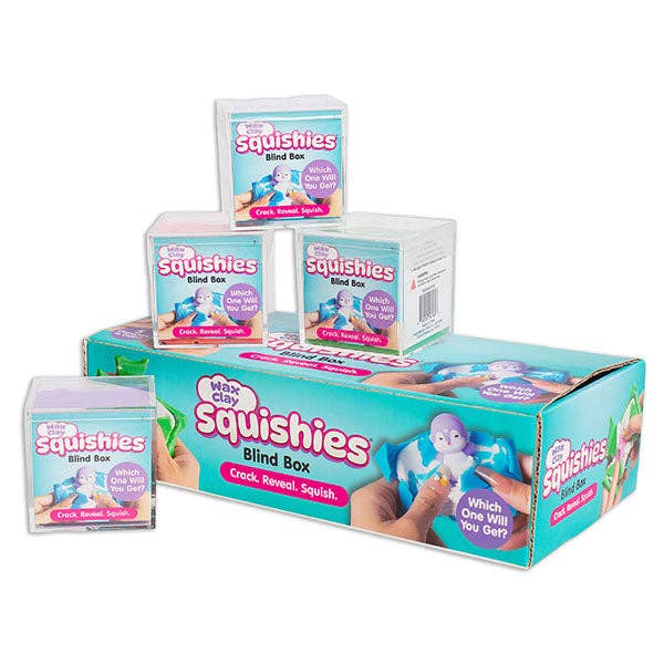 Wax Clay Squishies mystery blind boxes beside a pink and turquoise display carton