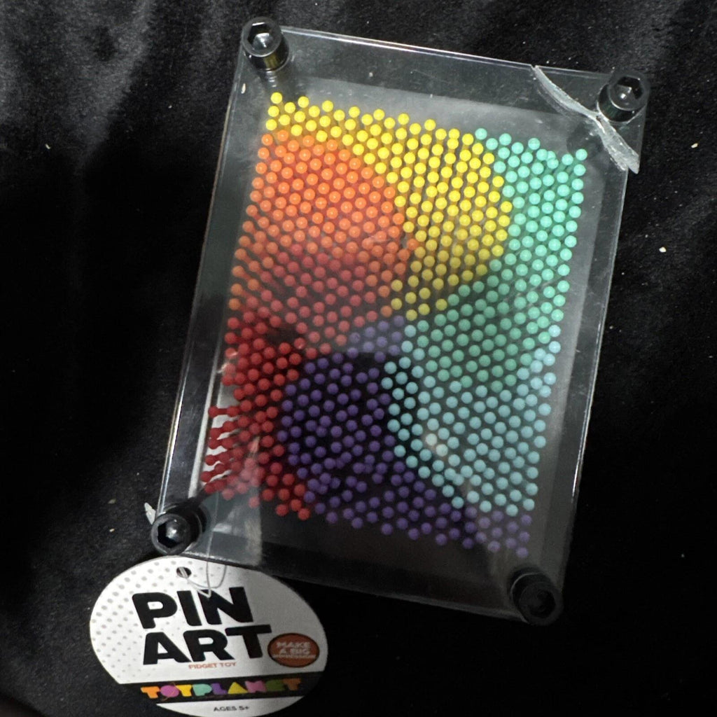 Rainbow pin-art design in a black rectangular frame, with Pin Art packaging