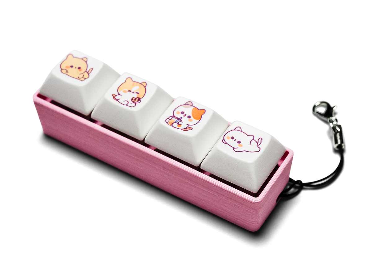 Mechanical keycap fidget with 4 keys and a pink base